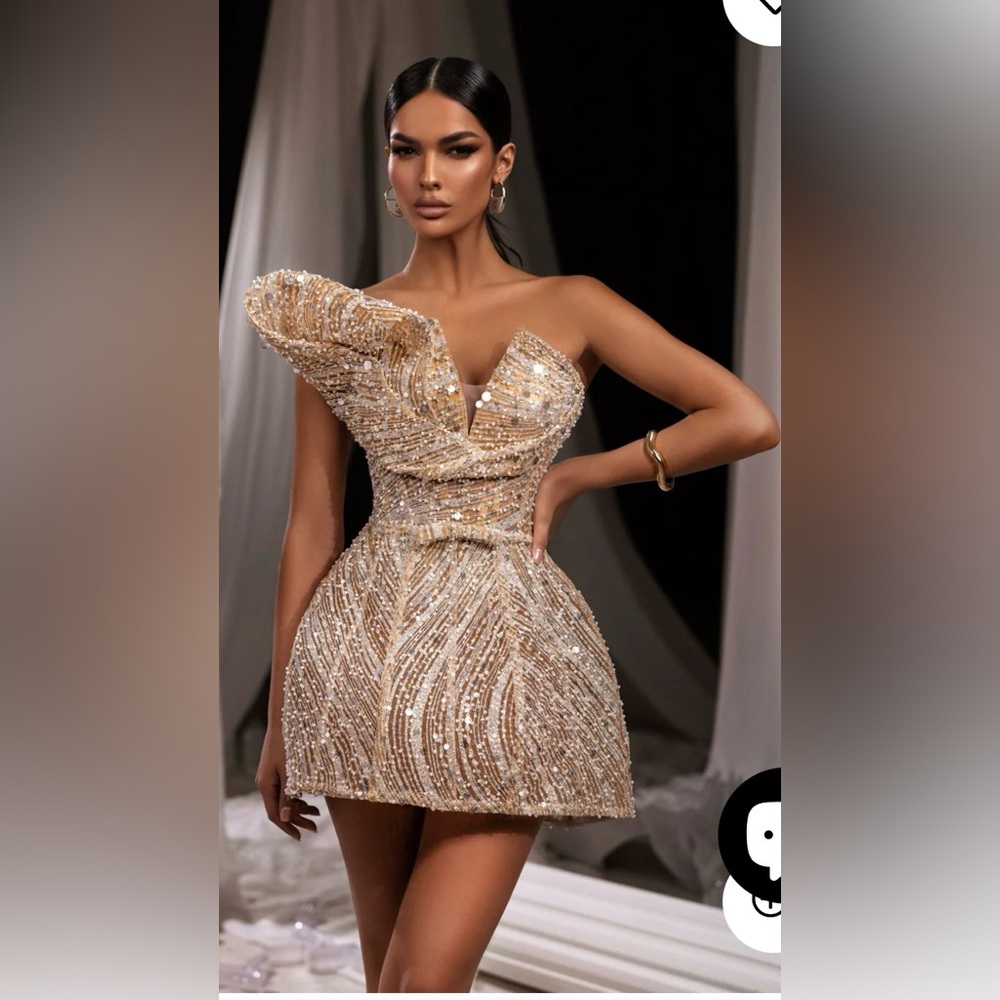 Donika Loci Dress. Gold dress with pearls and stones.